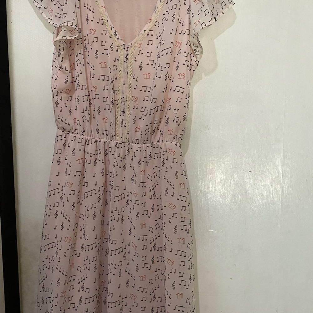 Women’s V-neck dress with music notes